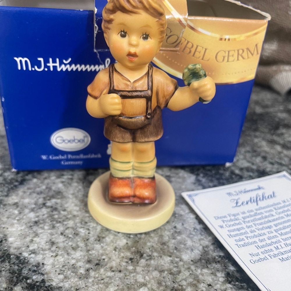 Goebel Hummel Boy Figurine - four leaf clover